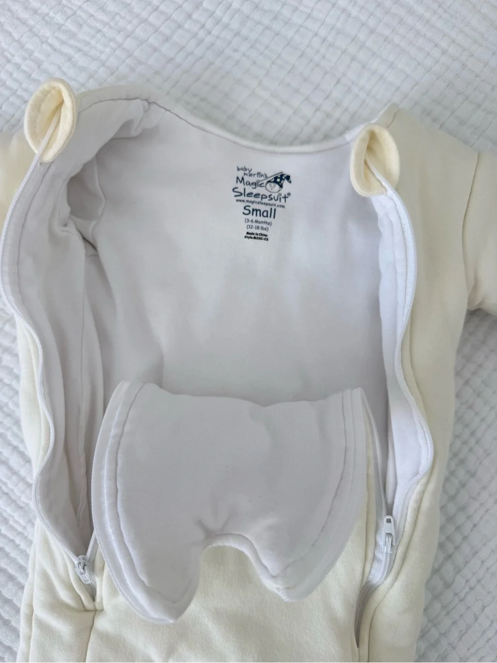 Baby Merlin’s Magic Sleepsuit - Cream color